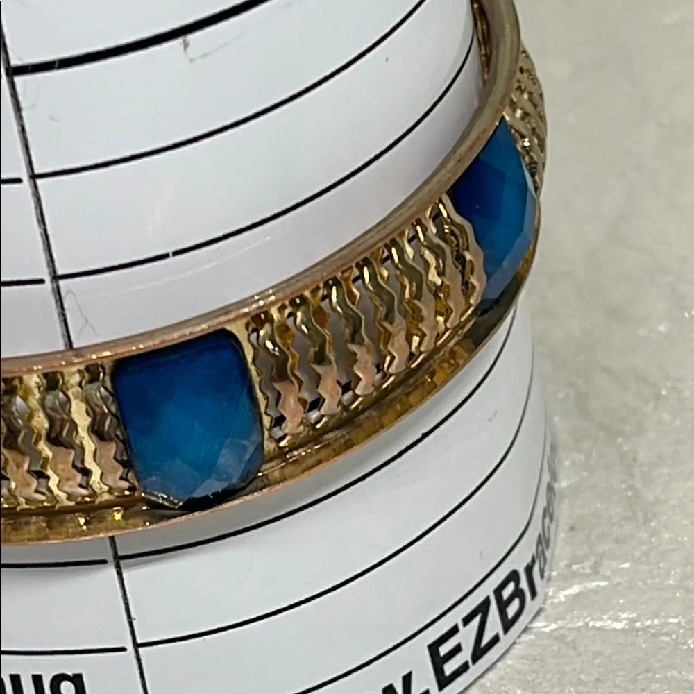 Goldtone and faceted Blue Bangle Bracelet